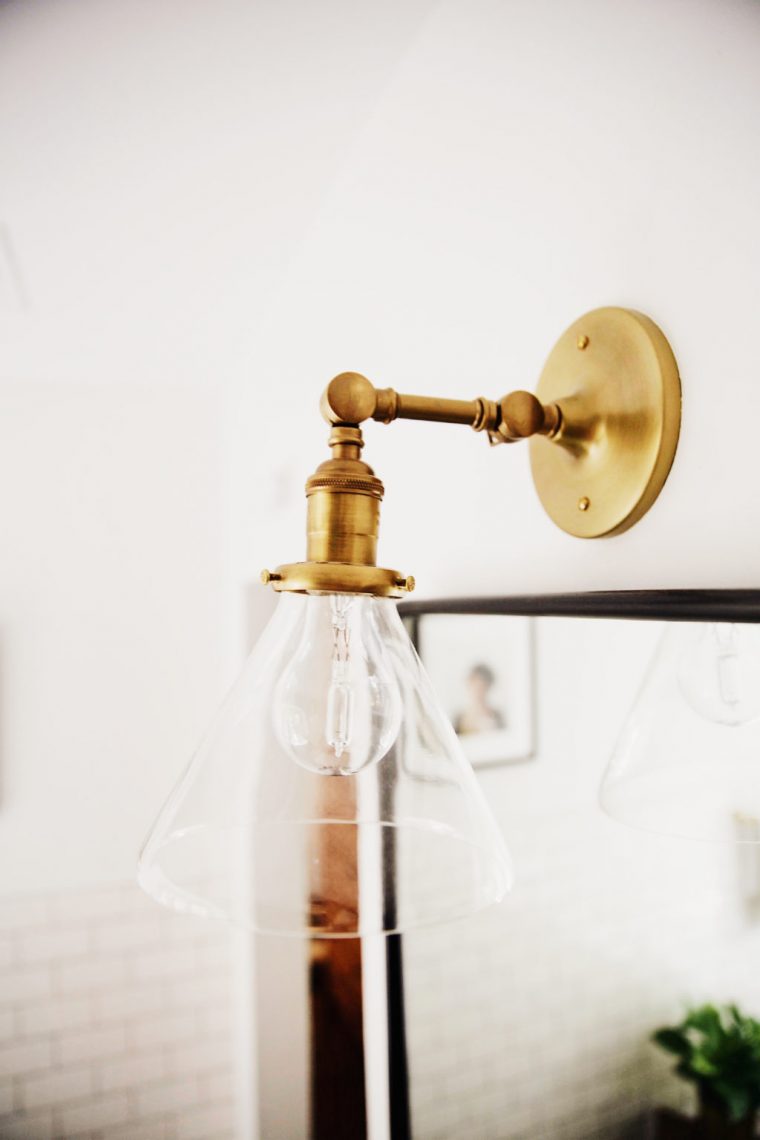 bathroom light fixture with brass finish