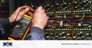 electrician testing electrical panel